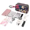 Venta al por mayor de fábrica nueva cartera monedero bolso femenino coreano estampado cartera bolso para teléfono móvil cartera de dama bolso de tela para correr