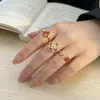 Nuevo Anillo Abierto de Lujo Ligero Estilo Chino Nicho Gama Alta con Carcasa de Esmalte Rojo, Perla, Fresa, Trébol de Cuatro Hojas, Calabaza para Mujer