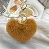 Llavero de Corazón de Melocotón de Felpa Más Vendido Colgante de Llavero de Bola de Pelo de Amor Colgante para Equipaje de Dama Coche Venta al por Mayor
