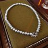Collar de perlas grises de alta gama, cadena de clavícula con hebilla de lujo accesible y de alta gama, estilo francés para mujer.