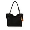 Bolso de gran capacidad con sensación holgada para mujer 2026 nuevo bolso de hombro individual retro para el trabajo bolso tote de alta gama para salir a trabajar