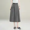 Falda midi de color liso en línea A, a la moda, para mujer, nueva colección otoño 2026, de cintura alta, estilizante, con caída fluida, versátil y casual