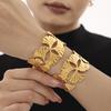 Pulsera Xinyixin de Acero Inoxidable con Hoja de Ginkgo Diseño Exagerado de Abertura Hueca Viento Europeo y Americano Chapado en Oro de 18k para Mujer
