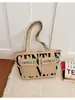 Estilo europeo y americano transfronterizo, directamente desde la fábrica de origen: bolsa de lona nueva con letras estampadas, adecuada para que los estudiantes la usen en clase, para ir de compras, o como bolso de hombro o bolso de axila