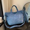 Bolso de mujer portátil de gran capacidad, primavera y verano 2024, nuevo bolso de tela de pana de estilo coreano, bolso bandolera informal sencillo.