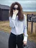 Elegante top de estilo francés con un toque de lujo ligero y alta gama, adecuado para ocasiones importantes, una camisa a rayas única y hermosa para mujeres en primavera