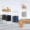 Nueva Funda Creativa de Cuero Vidrio de Borosilicato Alto con Cuerda Taza de Agua para Deportes al Aire Libre se venderá Taza Letras LOGOTIPO