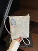Bolso Pequeño Bordado Estilo Chino Nuevo para Mujer 2026 Nueva Moda Estilo Nacional Bolso para Teléfono Móvil Bolso Cuadrado Pequeño Bolso Cruzado Texturizado de Verano