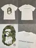 Camiseta unisex de manga curta da marca tendência BAPE, co-branded com design de camuflagem de cabeça de macaco, caimento solto de alta qualidade