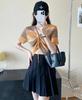 Tejido de punto de manga corta con cuello en V de colores, cordón y diseño recortado para mujer, nuevo de verano 2025, dulce y chic, top que reduce la edad
