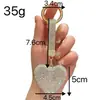 Chaveiro Coração de Amor Cravejado de Diamante Novo Modelo Transfronteiriço Pingente de Bolsa com Strass para Meninas Decoração de Chaveiro de Carro Atacado do Fabricante