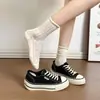 Zapatos de Lona con Cordones para Mujer Estilo Estudiante Cómodos Antideslizantes Resistentes al Desgaste Suela Gruesa Delgada Color Sólido Primavera/Verano 2026