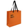 Bolsa de tote de papel recubierto impresión de LOGOTIPO personalizado fabricante venta al por mayor naranja bolsa de regalo bolsa de compras impresión personalizada