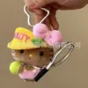 Llavero de peluche Hello Kitty, muñeco de sombrero de paja Hello Kitty de cuero negro, amuleto popular para bolsa de dibujos animados