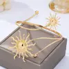 Brazalete abierto de doble capa estilo retro europeo y americano del dios del sol, brazalete de brazo de girasol chapado en oro, joyería de brazo personalizada, venta al por mayor transfronteriza