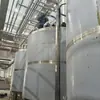 Línea de Producción de Llenado en Frío Estéril de Agua de Coco 12000 Botellas por Hora Zhongyilong Línea Estéril de Bebidas Sistema de Mezcla