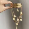 Joyería europea y americana, pulsera de borla estilo antiguo, diseño simple, brazalete abierto de metal, pulsera de alta gama, accesorios de mano al por mayor