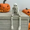 Nuevos artículos de decoración de esqueleto colgante de pierna de Halloween transfronterizos, adornos de resina de Halloween, accesorios para la decoración de escenas del Festival Fantasma
