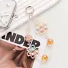 Corrente para Celular com Pingente Flor de Cristal Avançada Alça de Pulso Curta Ins Moda Pequeno Fresco Enfeites para Pendurar no Celular Pendurado com Contas
