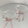 Coleção de PulseirasPulseiras florais de borboleta populares mais vendidas, designs de estrelas de nicho, pulseiras versáteis estilo floresta