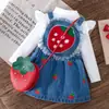 2026 Nuevo Otoño Transfronterizo Conjunto de 3 Piezas para Bebé y Niño Pequeño: Top Estampado de Mangas Volantes + Falda de Mezclilla con Tirantes Bordados con Bolso