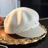 Otoño e Invierno Estilo Retro Simple Elegante Lana Pura Sombrero de Lana Pedrería Cuero Parche de Lana Gorra Plana Sombrero Octogonal