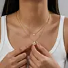 Colar minimalista em aço inoxidável de nicho europeu e americano com pingente em formato de leque de pérola retrátil em forma de Y, olho grego, colar multicamadas