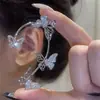 Pendientes de mariposa de circón exquisitos de nicho de lujo ligero estilo ins de moda para fotografía callejera pendientes sin agujero pendientes colgantes de oreja joyería
