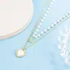 Colar Feminino de Pérola em Forma de Coração com Duas Camadas Levemente Luxuoso Design de Alto Padrão Nicho Camadas Popular Corrente Lockbone Gargantilha Novo 2022
