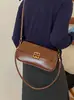 Bolso de axila de alta gama para mujer, nueva colección invierno 2026, de nicho y a la moda, bolso cuadrado pequeño versátil, adecuado para el trabajo y los desplazamientos, bolso de hombro