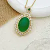 Collar Más Vendido: Colgante Ruyi de Paz y Seguridad Estilo Nuevo, Diseño Retro de Nicho para Mujer, Accesorio de Acero de Titanio que no se decolora