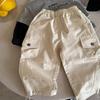 Liquidación Pantalones Largos para Niños Primavera Nuevas Llegadas Niños y Niñas Color Sólido Bolsillo Pantalones Cargo Bebé Cordón Jogger Pantalones Estilo Primavera y Otoño
