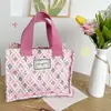 Bolsa de almuerzo floral de color block francesa para compras en Ins Salidas Bolsa de almacenamiento portátil de mano Bolsa para mamá Bolsa para lonchera
