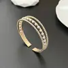 Pulsera Abierta de Múltiples Capas con Perlas Pulsera de Venta Caliente Transfronteriza Europea y Americana Joyería de Mano de Temperamento de Alta Calidad para Mujeres B061