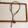 Colar com Pingente de Chave de Coração para Mulheres, Corrente Longa Preta Trançada de Suéter de Luxo Leve de Nicho, Tendência de Acessório Outono e Inverno