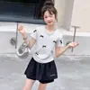 Conjunto de Verano para Niñas 2026 Nuevo Dulce Estilo Coreano para Niños Mayores, Top de Manga Corta con Lazo Combinado con Conjunto de Falda