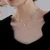 Artículo popular de alta calidad collar de perlas Dai Fei plateado triturado lujo ligero sensación de alta gama cadena para clavícula de nicho cadena para suéter 2026 nuevo