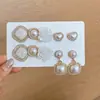 Pendientes plisados de flor redonda de metal de aguja plateada, de moda, sencillos, de lujo ligero, pendientes de alta gama, pendientes versátiles y exquisitos para mujer