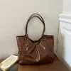 Bolso de Mano Retro Brillante Transfronterizo para Mujer Otoño/Invierno 2026 Nuevo Versátil Gran Capacidad para el Trabajo con un Solo Hombro Debajo del Brazo