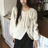 Blusa chic coreana para ir al trabajo, de cuello redondo, con corbata irregular en la parte delantera