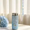 Copo térmico Huaxiang 8017 em titânio puro a vácuo com textura de flor de gelo cristalina, isolamento a vácuo de camada dupla para quente e frio, portátil e personalizável para presentear