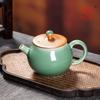 Tetera de cerámica con filtro Longquan Celadon, hecha a mano, creativa, con forma de cuchillo, juego de té chino de Kung Fu para el hogar