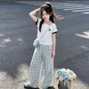Conjunto de Tendencia de Moda 2026 Verano Nuevo Estilo Coreano Camisa Polo de Manga Corta Pantalones Anchos Casuales a Cuadros Conjunto de Dos Piezas