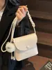 Bolsa de cubo popular de moda al por mayor, estilo simple de nicho, exquisita, portátil, bolso cruzado versátil casual para mujer, para el trabajo