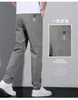 Pantalones casuales de envío directo para hombre Xintang, corte recto holgado para hombre, estilo delgado para primavera y verano, pantalones rectos versátiles de marca de moda