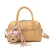 Bolsa Boston Feminina Super Popular Primavera/Verão 2026 Nova Versátil Bolsa Transversal para o Trabalho Pequena de Mão Bolsa Almofada