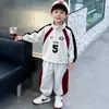 Conjunto Deportivo para Niños Primavera y Otoño 2026 Nuevo Sudadera Deportiva Infantil Conjunto de Dos Piezas Bebé Estilo Coreano Guapo Estilo Urbano Moderno