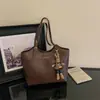 Bolso Retro de Gran Capacidad para Mujer 2026 Nuevo Bolso de Hombro Individual Casual para el Trabajo y el Viaje Bolso Tote Sencillo de Moda con Textura