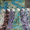 Nueva tela jacquard con estampado de flores de seda dorada de estilo europeo y americano con textura de burbujas y brocado para bolsos y vestidos de moda.
