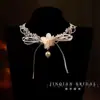 Cadena para la clavícula con borla de flor estilo hada del bosque, collar dulce elegante para novia, juego de accesorios de alta gama para vestido de novia